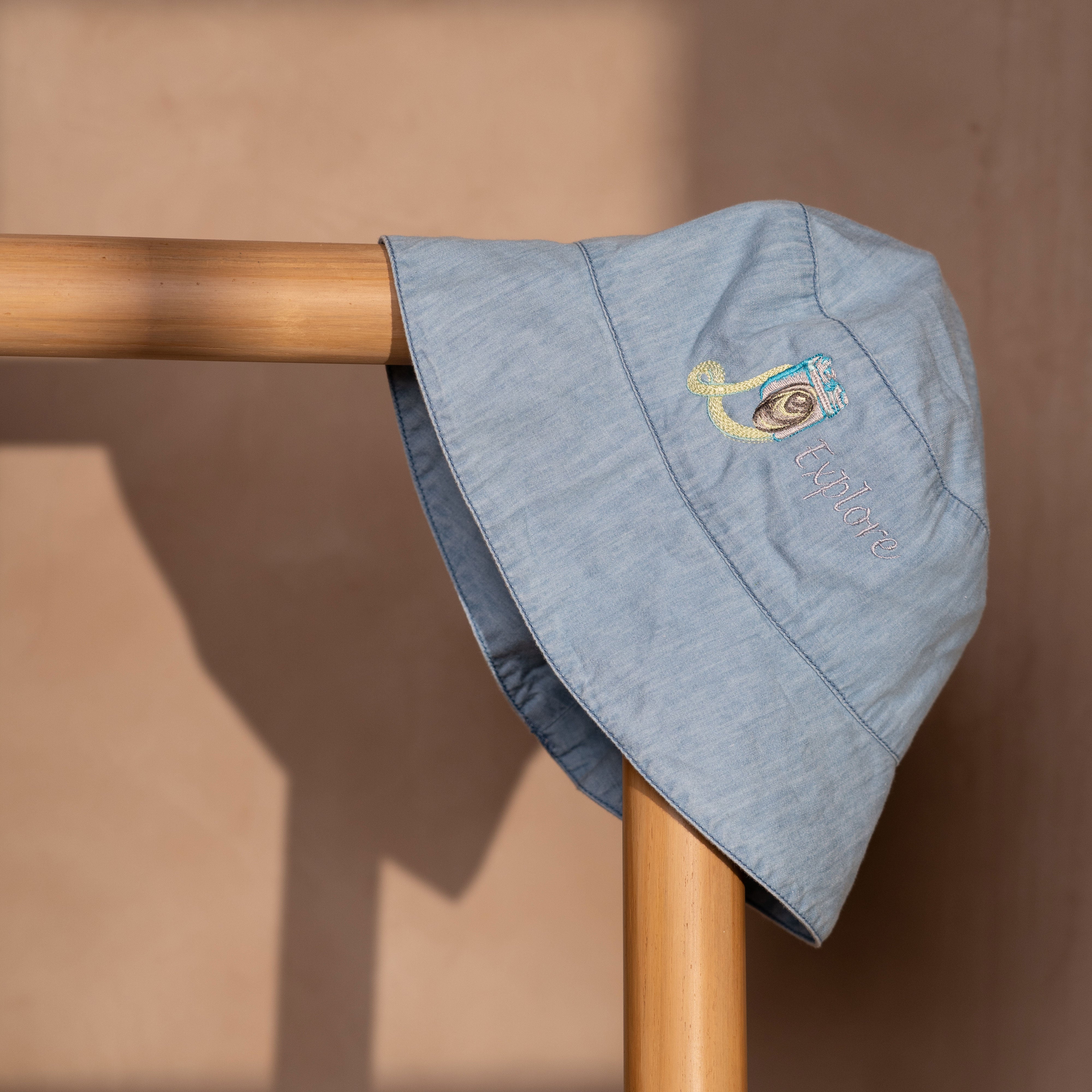 Passport To Wonderland Light Denim Bucket Hat